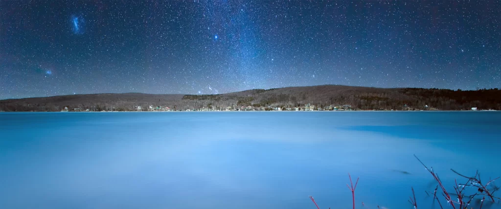 night sky stars lake mountains village