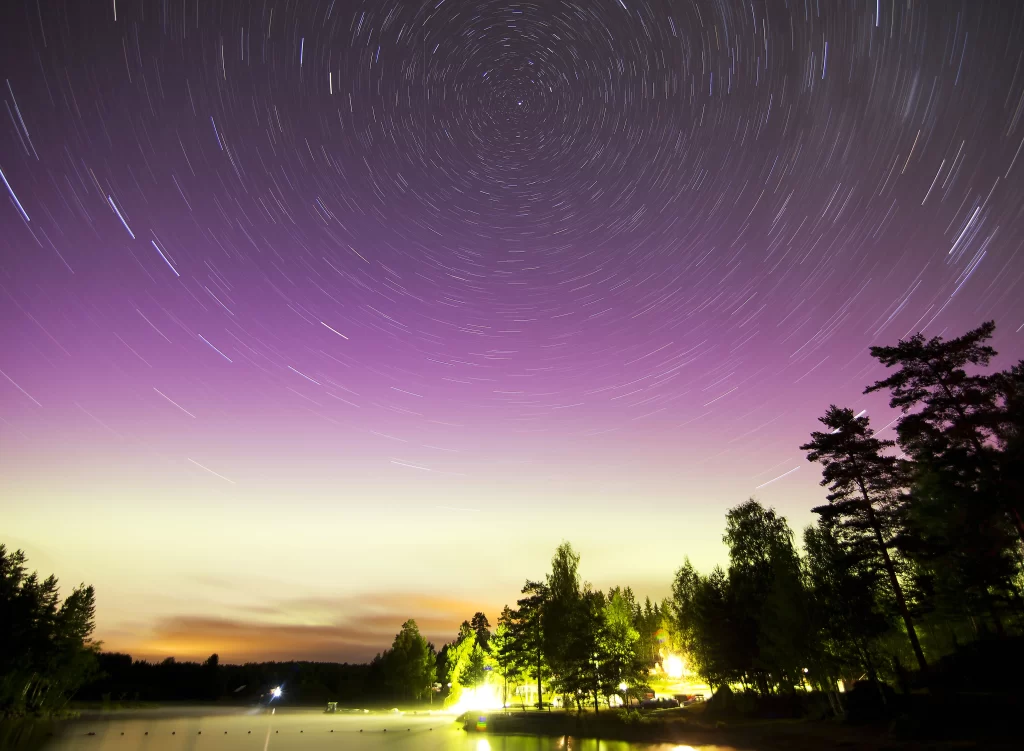 night sky stars lake trees
