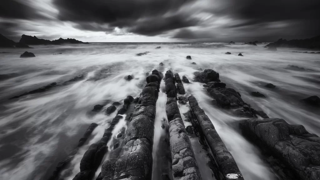 ocean waves rocks clouds sky