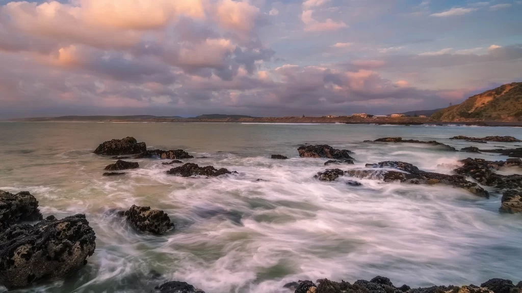 ocean waves rocks coastline sunset