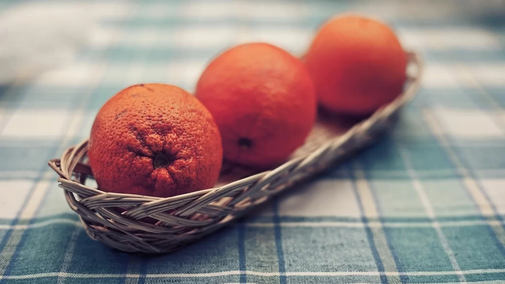 oranges basket tablecloth checkered texture still life natural fresh