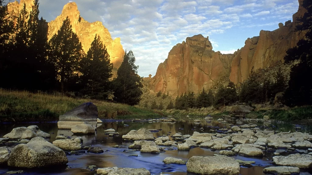 river rocks canyon trees sky