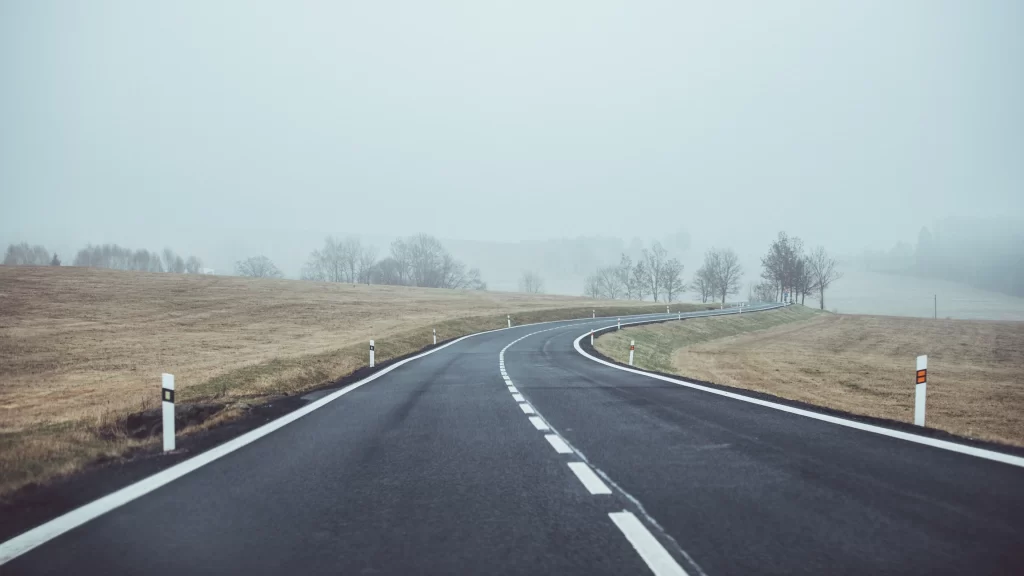 road fog trees field curve landscape