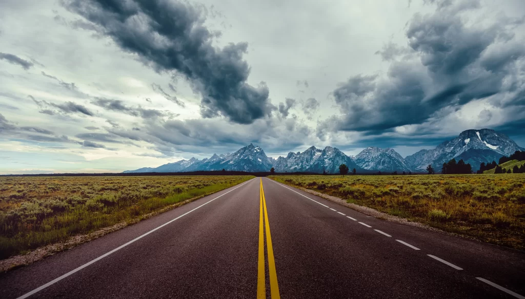 road mountains clouds landscape nature journey