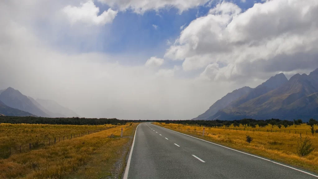 road mountains sky clouds landscape nature
