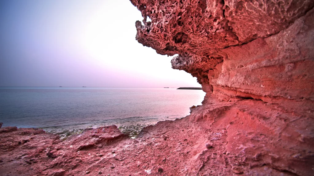 rocky coast sunset ocean calm serene