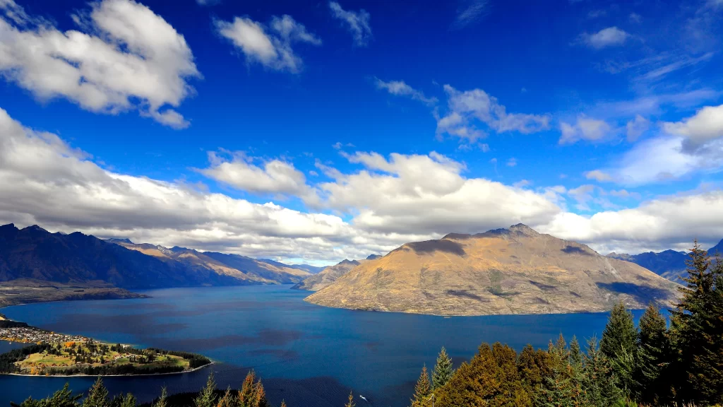 sky clouds mountains lake trees landscape