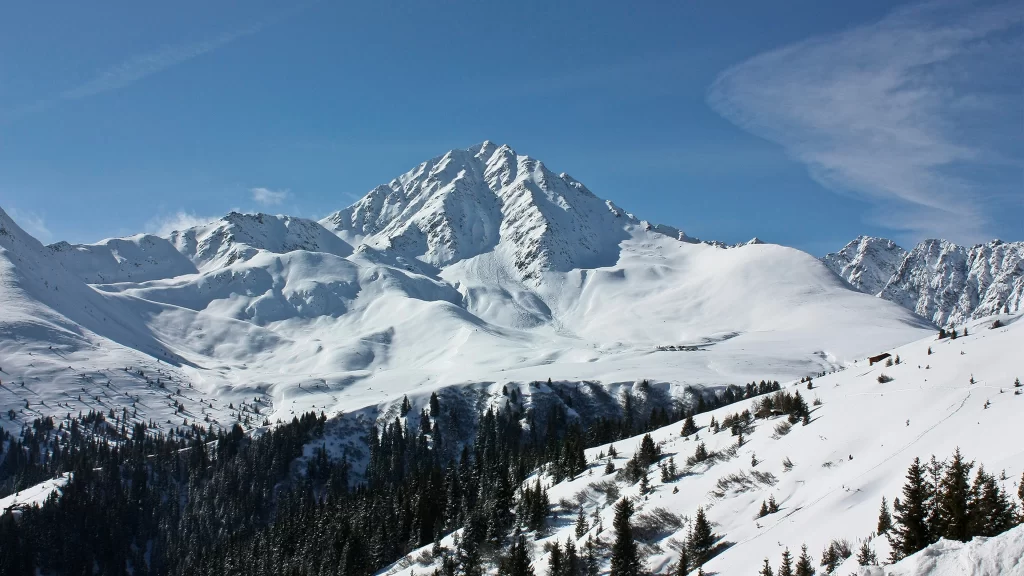 snow mountain clear sky trees