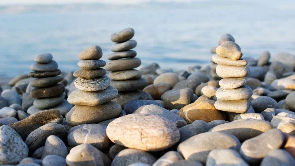 stone stack beach balance nature tranquility harmony