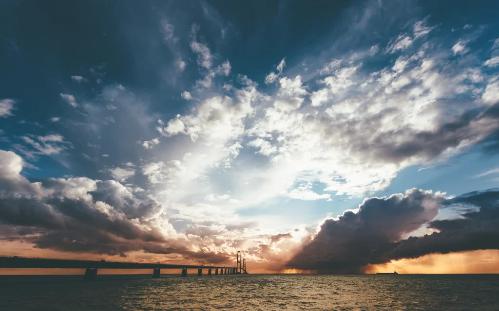 sunset clouds ocean bridge sky horizon