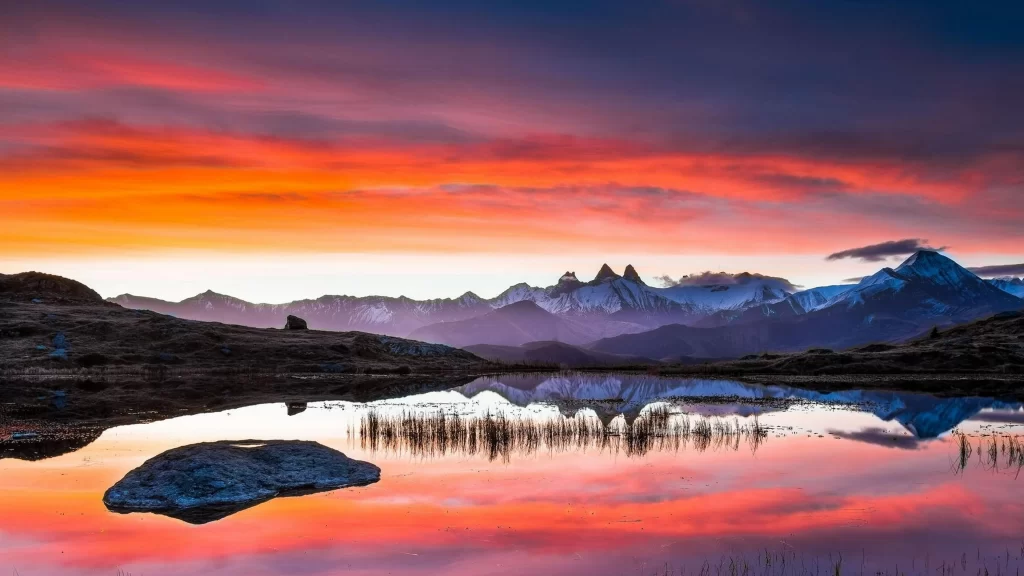 sunset mountains reflection lake sky colors