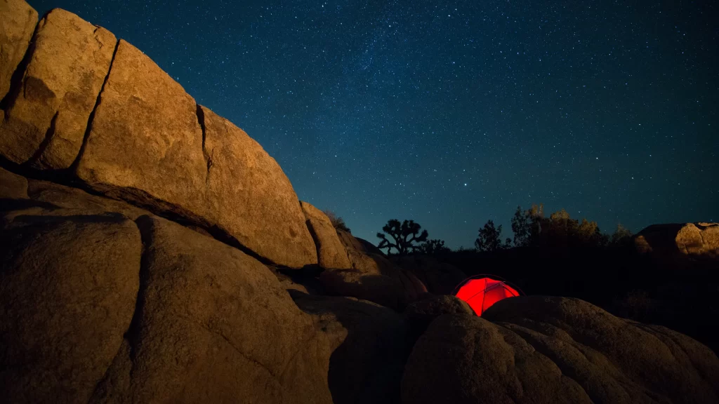 tent stars night camping rocks sky