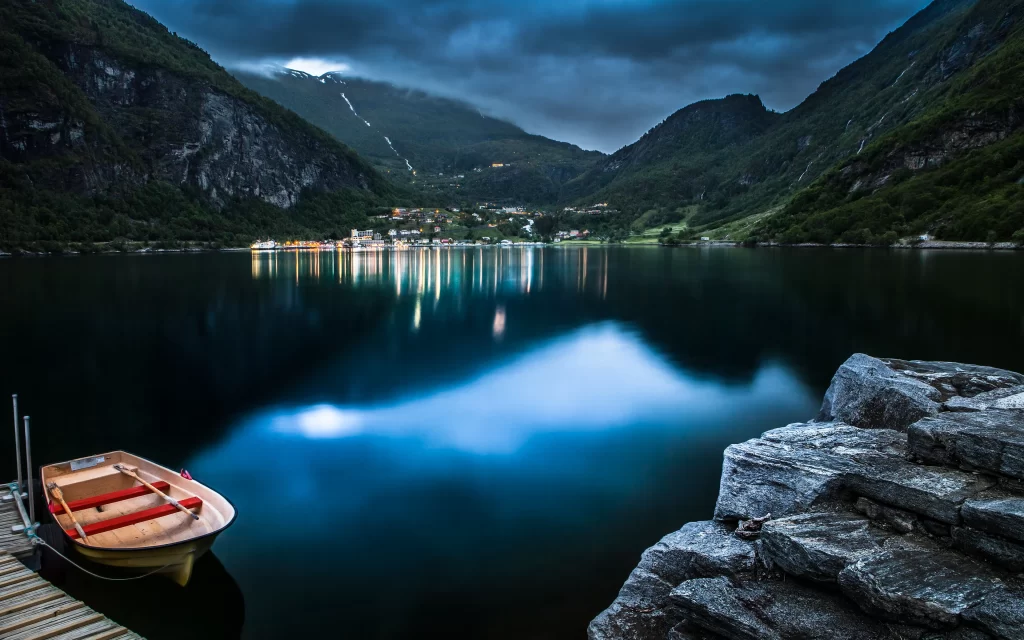 Tranquil Lake Mountainous Landscape Reflection Wooden Dock Boat