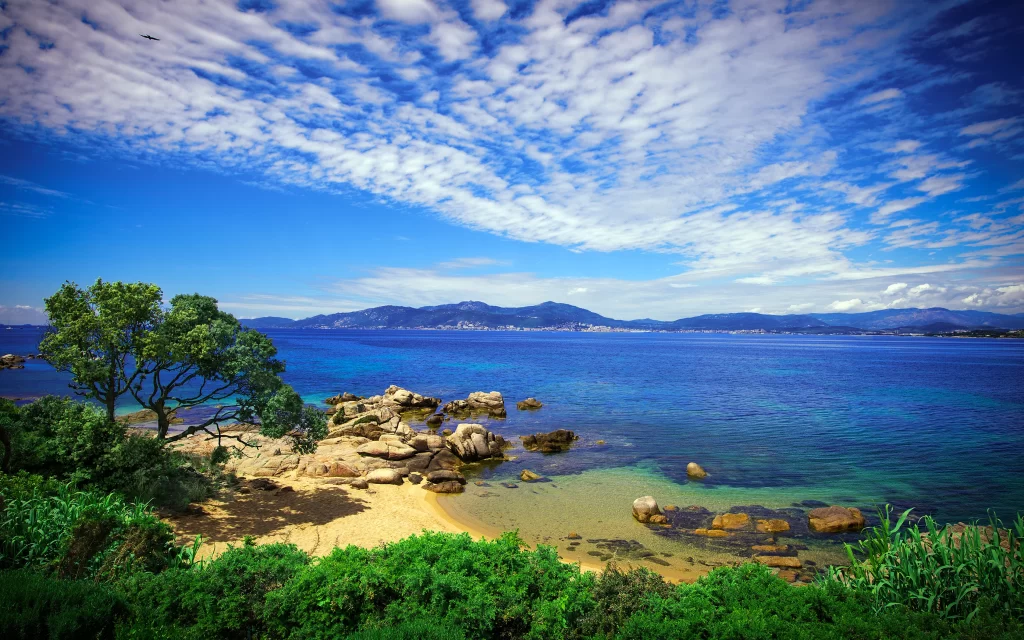 Blue Sky White Clouds Clear Water Rocky Shore Greenery