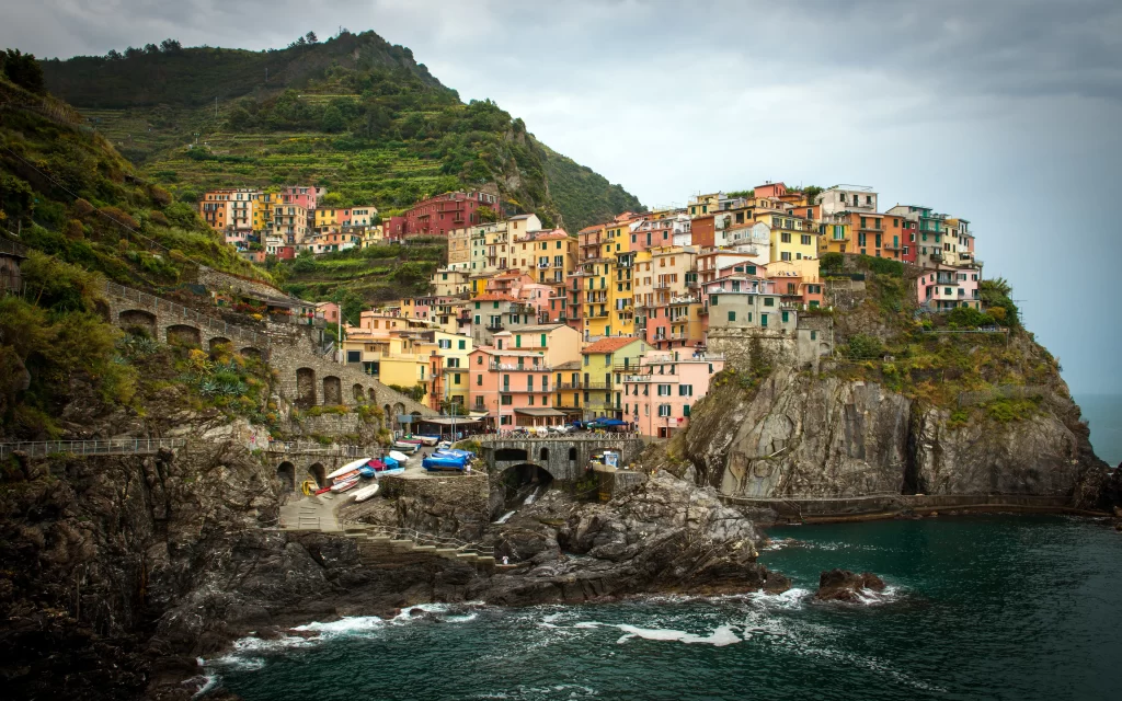 Colorful Houses Cliffside Mediterranean Sea Rocky Shoreline