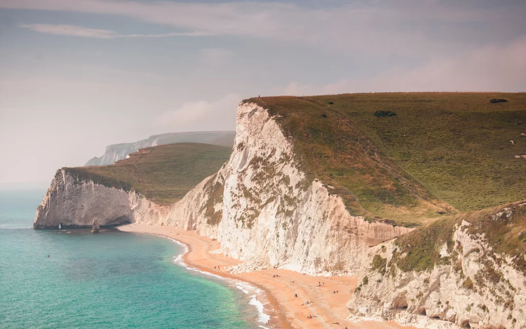 Beach Cliffs Ocean Waves Sandy Shoreline