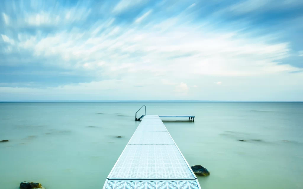 Calm Sea Pier Cloudy Sky Tranquil Horizon