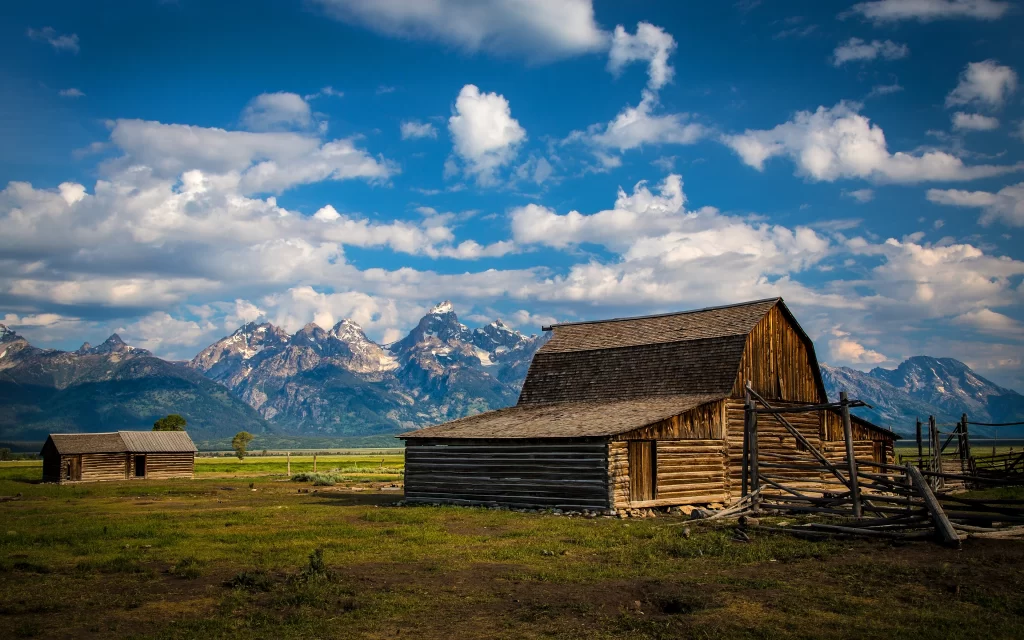 Rustic Barns Mountain Range Cloudy Sky Prairie