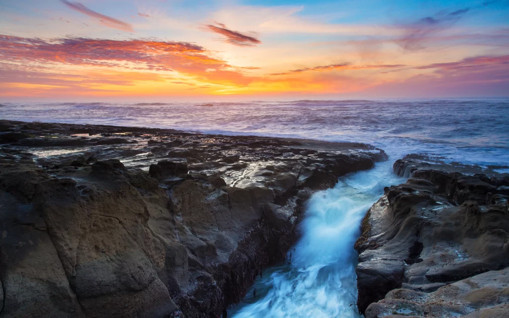 Sunset Ocean Waves Rocky Shoreline Horizon