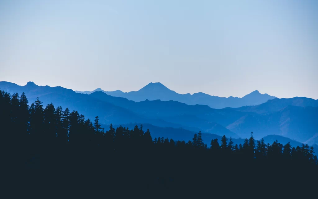 Mountain Range Silhouettes Blue Sky Forest Peaks