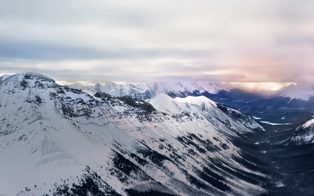 Snowy Mountains Majestic Peaks Clouds Sunlight