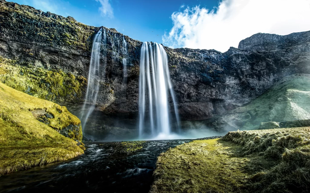 Waterfall Rocky Cliff Mist Greenery Blue Sky