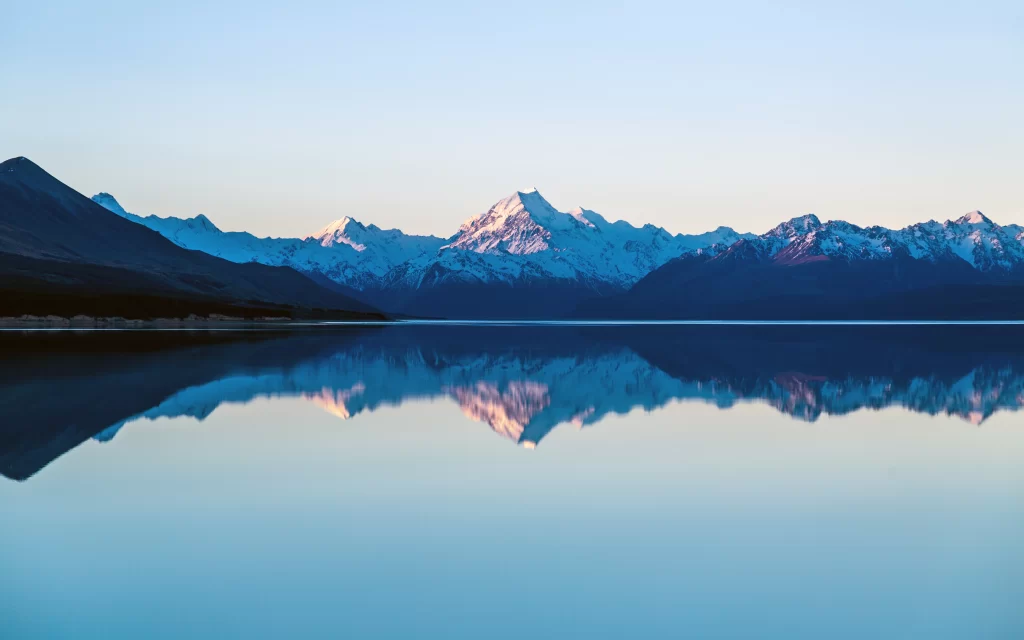 Snowy Mountains Reflective Lake Calm Water Blue Sky
