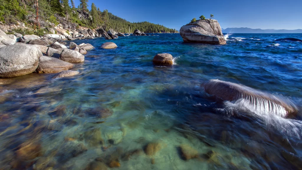 water rocks clear blue sky nature
