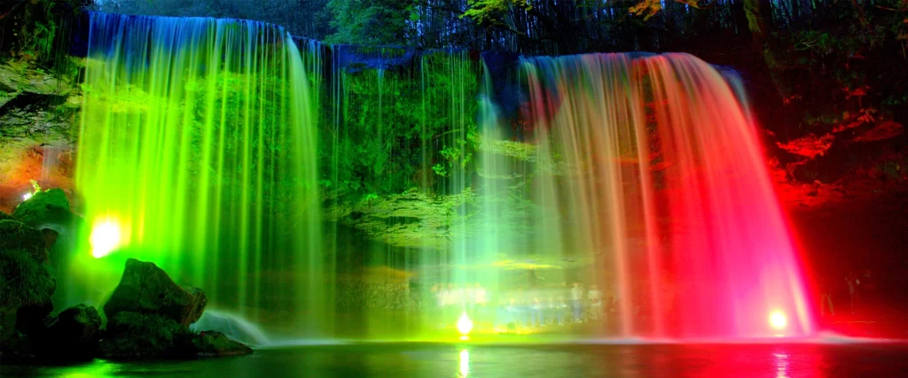 waterfall colorful lights nature serene vibrant