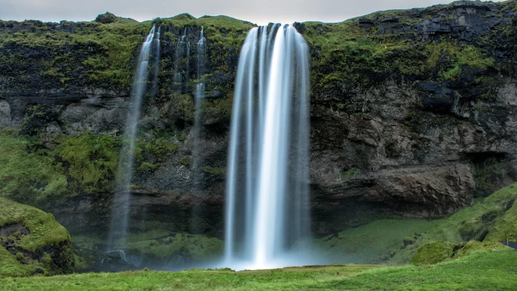 waterfall nature landscape greenery rock