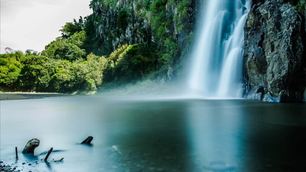 waterfall nature serene landscape tranquil beauty
