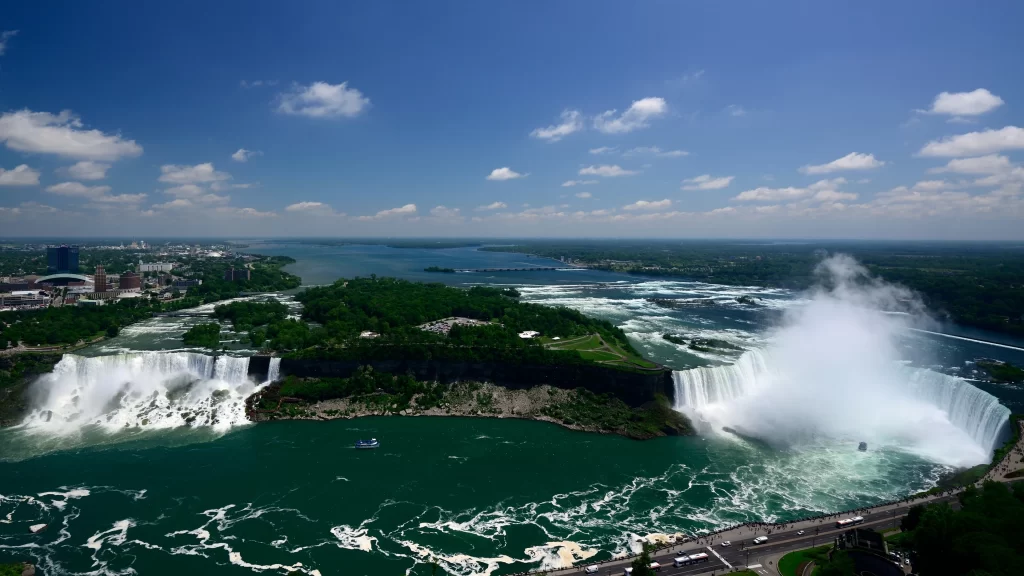 waterfall river city sky clouds nature
