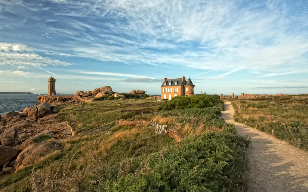 Lighthouse Coastal Pathway Rocky Shoreline Scenic View