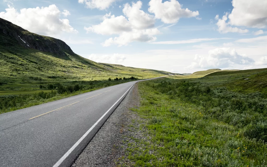 Road Green Hills Blue Sky Clouds Nature