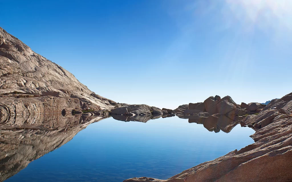 Rocky Mountain Lake Reflection Blue Sky Sunlight