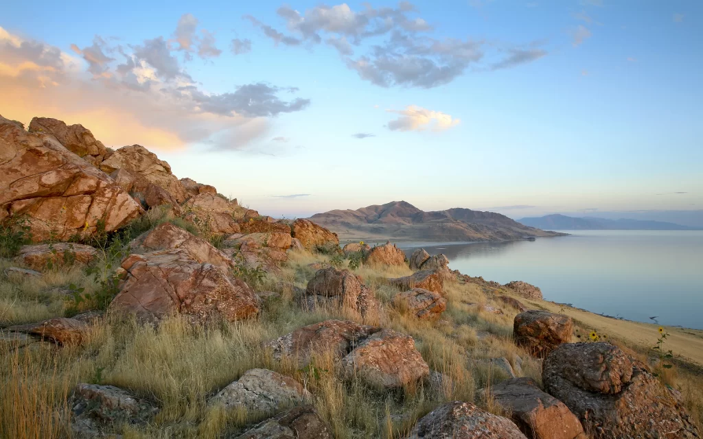 Rocky Terrain Grass Lake Mountains Sunset Clouds