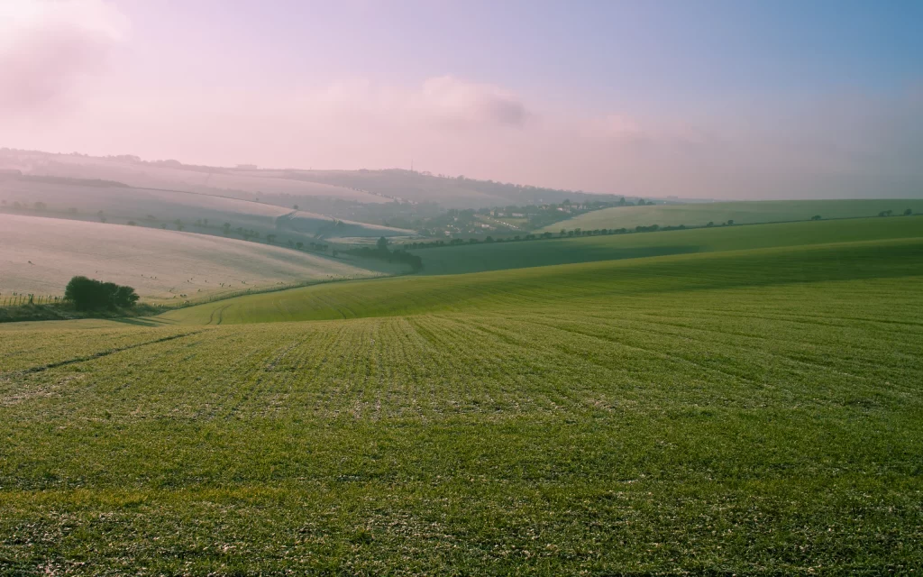 Rolling Hills Green Fields Blue Sky Clouds Sunrise