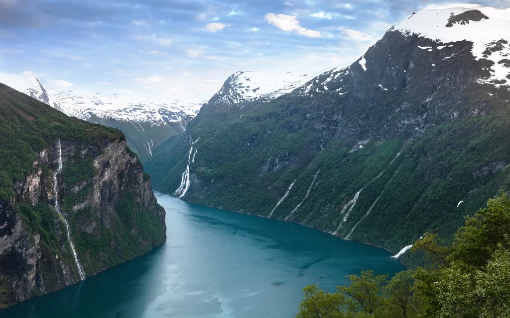 Snowy Mountains Deep Blue Water Green Forest Waterfalls Clear Sky Majestic Landscape