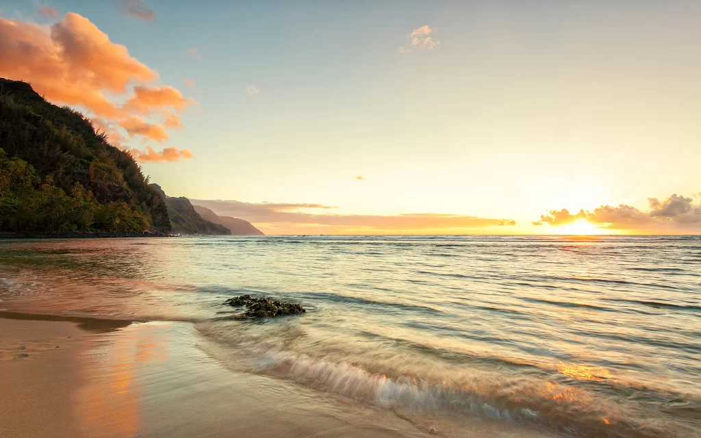 Sunset Ocean Waves Beach Golden Rocky Shoreline Calm Waters Scenic View