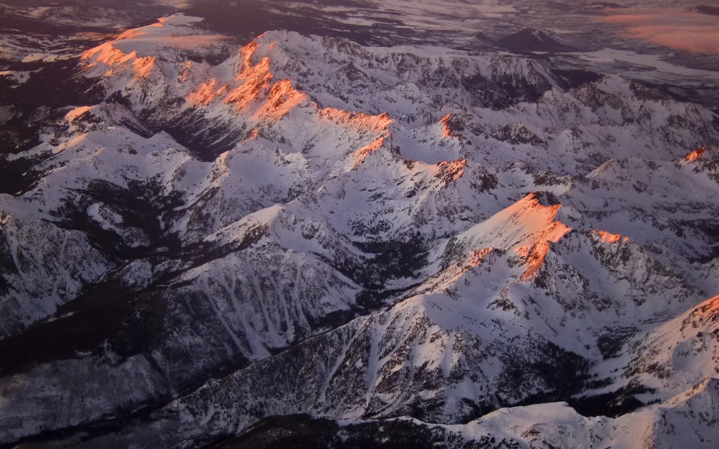 Sunset Snowy Peaks Mountain Range Majestic Landscape Aerial View