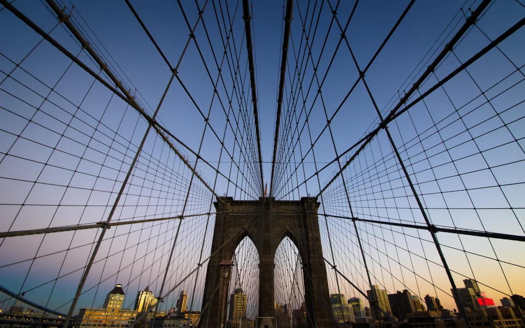 Suspension Bridge Steel Cables Cityscape Skyline Sunset